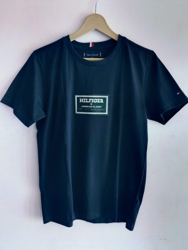 Tommy Hilfiger Men Solid Round Neck Cotton T-Shirt - Image 4