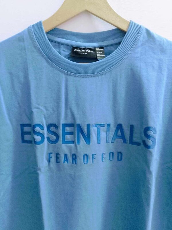 Shop Fear of God Essentials Blue Colour  T-Shirt - Image 2